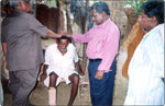 Rev. Dr. David John Director TGTSM & Rev. Dr. james Purushotham ASS. Pastor of throne of Grace church praying for the side in Peddaramcharla village in Ian Jangam, A.P., click here to see large picture.